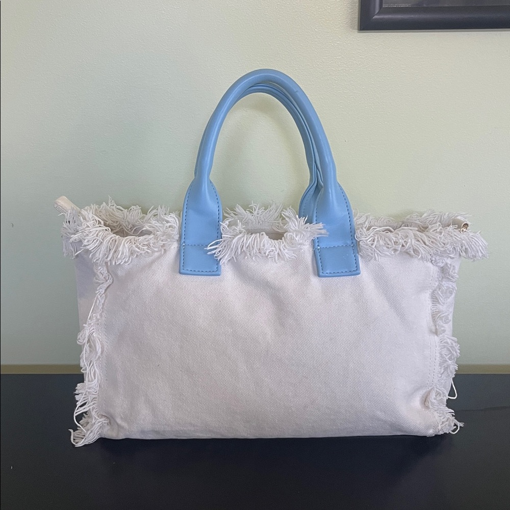 Ah-dorned fringe canvas tote bag